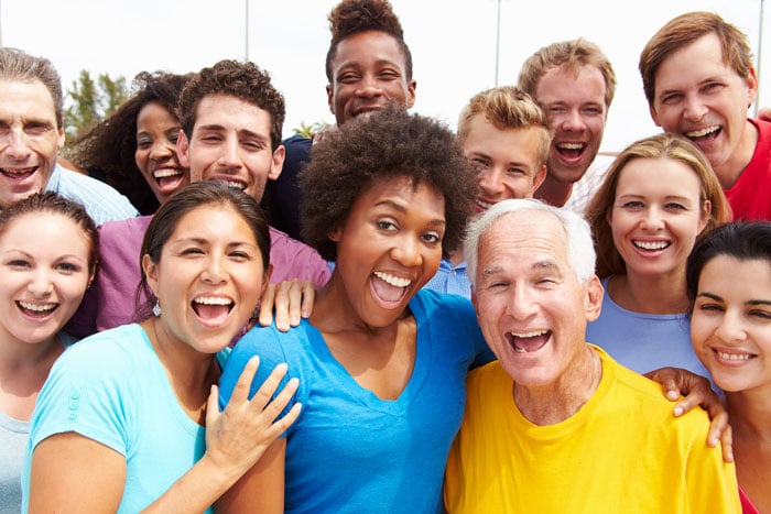 Smiling crowd about dental implants